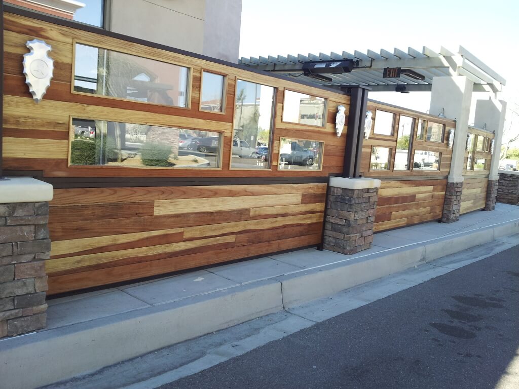 resatraunt outside fence with panels